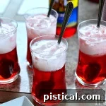 A small glass of Cherry Italian Cream Soda, ready to be served.