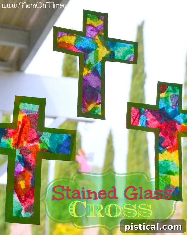 Colorful Stained Glass Cross Craft displayed on a window for Easter decoration.