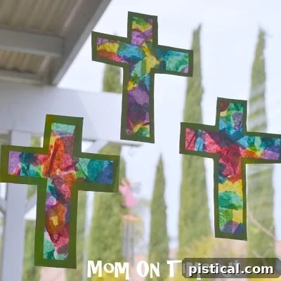 Close-up of torn colorful tissue paper pieces ready for crafting.