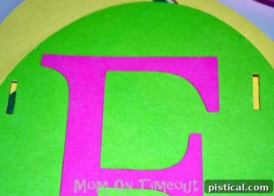 DIY Festive Easter Egg Banner 6 Threading 'Happy' eggs onto ribbon