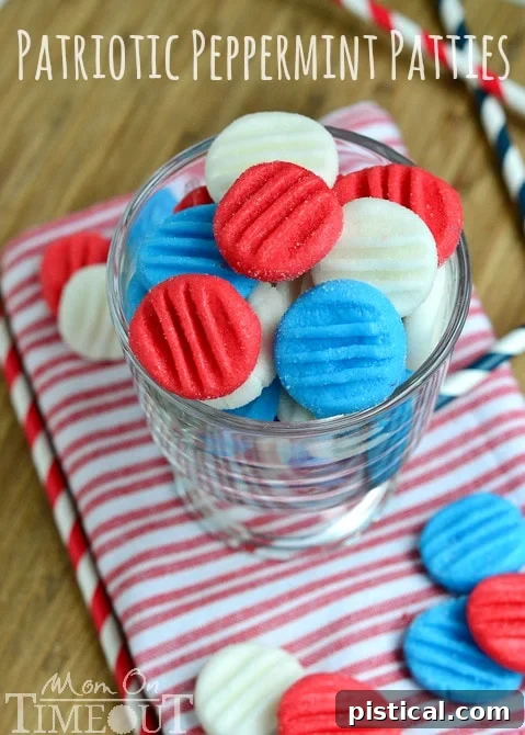 Red, White and Blue Peppermint Patties: Easy, Customizable, and Delicious Holiday Candy! Close-up of vibrant Red, White, and Blue Patriotic Peppermint Patties arranged on a festive plate, perfect for 4th of July or Memorial Day celebrations. These homemade candies are easy to make and delicious.