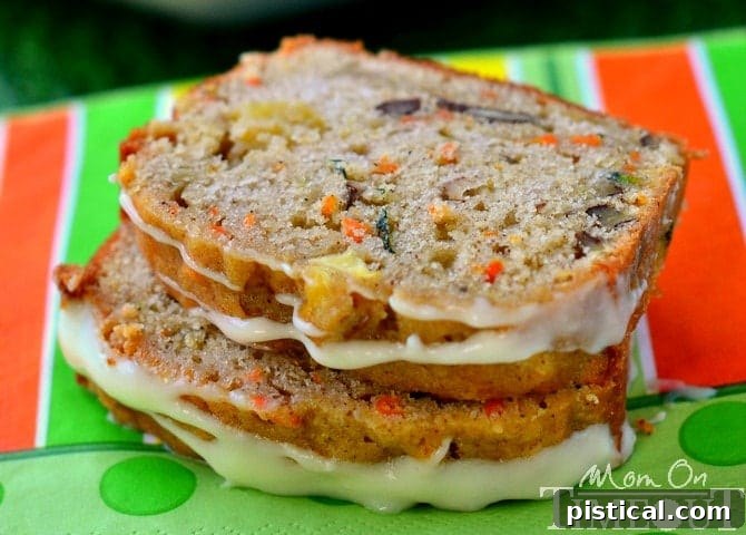 Freshly baked loaf of Carrot Zucchini Apple Bread with a delicious golden-brown crust, showcasing the rustic charm of homemade bread.