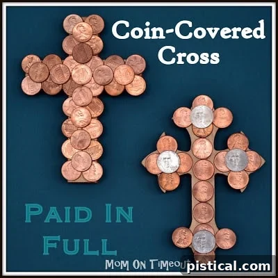 Two coin-covered crosses displayed together, highlighting different design variations and sizes