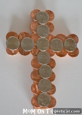 Vertically oriented coin-covered cross, showcasing the beautifully finished Easter craft