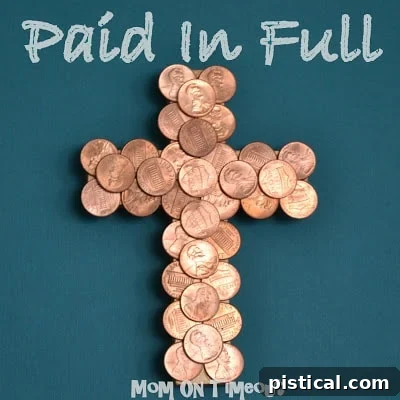 Another view of the sparkling coin-covered cross, reflecting sunlight beautifully