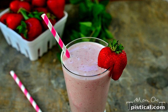 Easy Strawberry Milkshake with Malted Milk Homemade strawberry milkshake with a secret ingredient, garnished with fresh strawberries