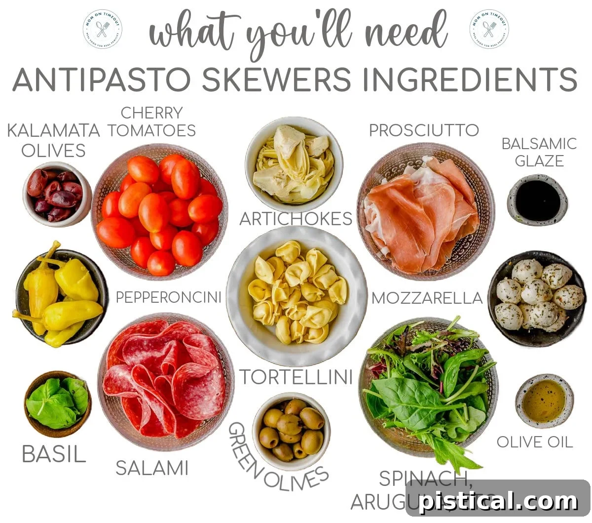 Various antipasto skewer ingredients laid out in small bowls on a wooden cutting board, ready for assembly.