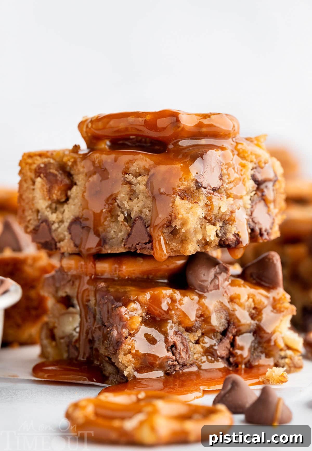 Sweet Salty Blondie Squares 2 A stack of blondies with salted caramel sauce drizzled on top.