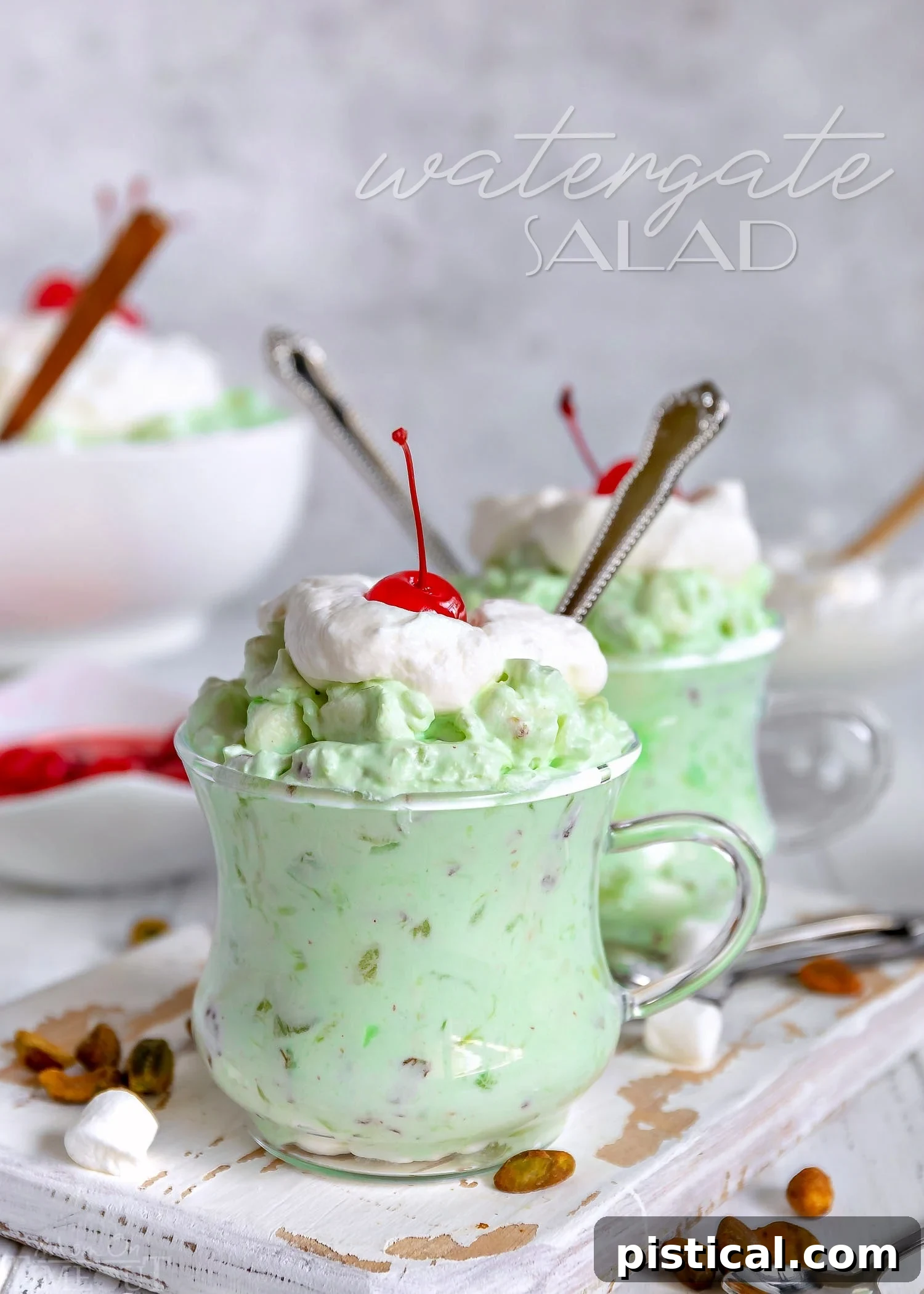 Classic Watergate Salad, a vibrant green dessert made with pistachio pudding, pineapple, marshmallows, and Cool Whip, garnished with fresh pistachios.