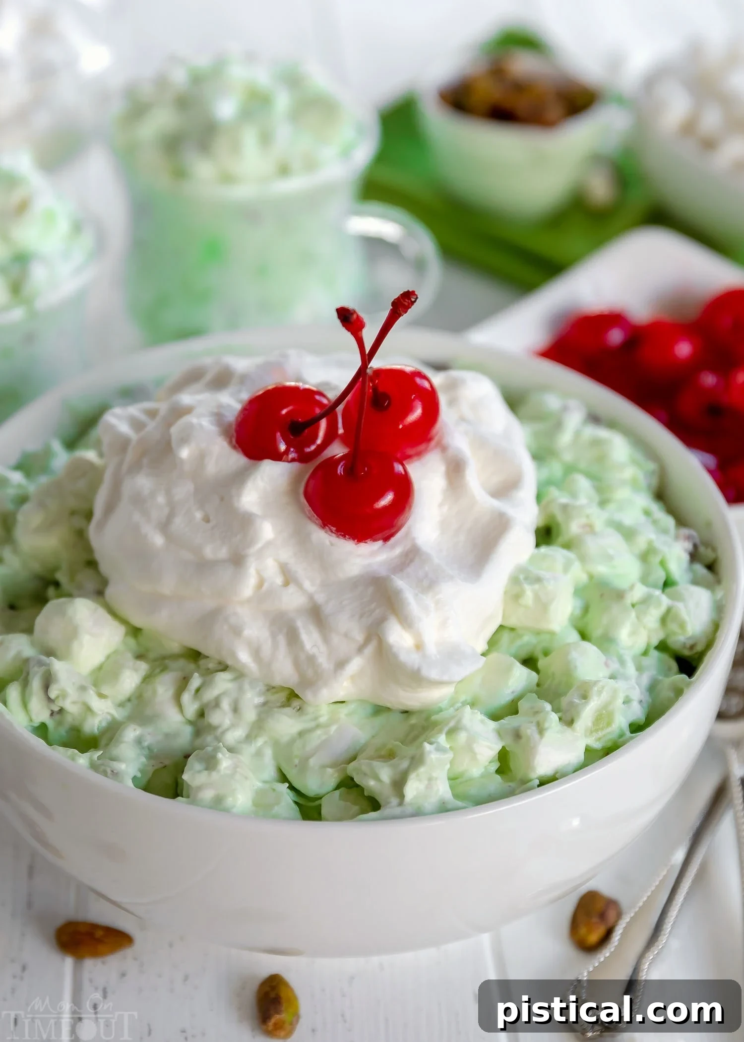 Watergate Salad ready to be served, showcasing its fluffy texture and the delightful mix of ingredients like marshmallows and nuts.