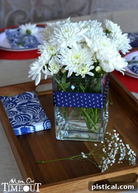 Low and full floral centerpiece for a Labor Day table setting