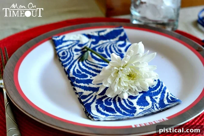 Close-up of a fresh flower adorning a plate at a Labor Day dinner