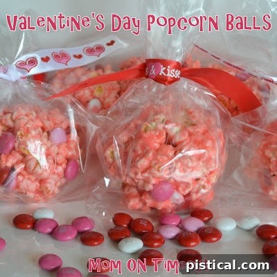 Sweetheart Popcorn Bites 12 Close-up of a festive Valentine's Day Popcorn Ball with visible M&Ms.