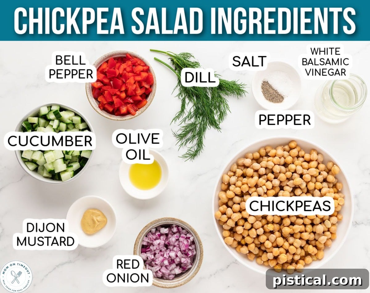 Overheat shot of ingredients for Chickpea Salad measured out into small bowls and ready to be used in the recipe. Text title at top of image.