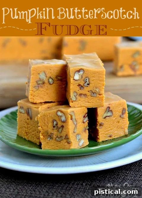 A close-up shot of creamy, square-cut Butterscotch Pumpkin Fudge pieces, garnished for autumn, highlighting its rich texture and seasonal appeal. Perfect for fall and holiday dessert tables.