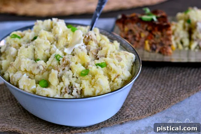 A close-up of the rich and creamy Slow Cooker Garlic Buttermilk Mashed Potatoes