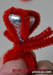 Close-up of a completed Hershey's Kiss Valentine's Day ring, showcasing the 'bling' effect.