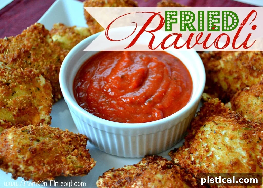 Golden brown fried ravioli arranged on a platter, ready to be served.