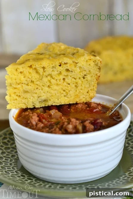 Slow Cooker Mexican Cornbread with Green Chiles and Cheese! A moist and flavorful side dish perfect for chili. | MomOnTimeout.com