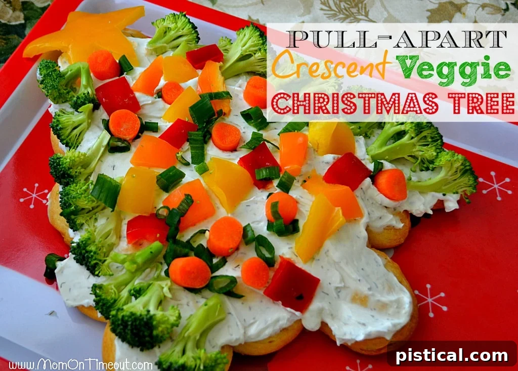 Fully decorated Pull-Apart Crescent Veggie Christmas Tree on a rustic wooden background