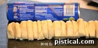 Pillsbury Crescent Rolls dough ready to be cut into slices for the Christmas tree base