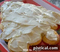 Freshly baked golden brown crescent roll Christmas tree cooling on a wire rack