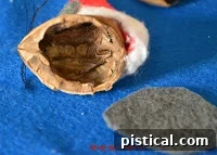 Whimsical Santa Mouse Ornament 16 Tracing the walnut base onto gray felt to create the body shape