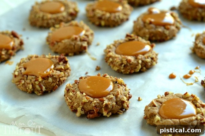Caramel Spice Thumbprint Cookies with a rich, melted caramel center before baking.