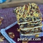 A single Turtle Pecan Pie Bar, showing its rich caramel and pecan filling.