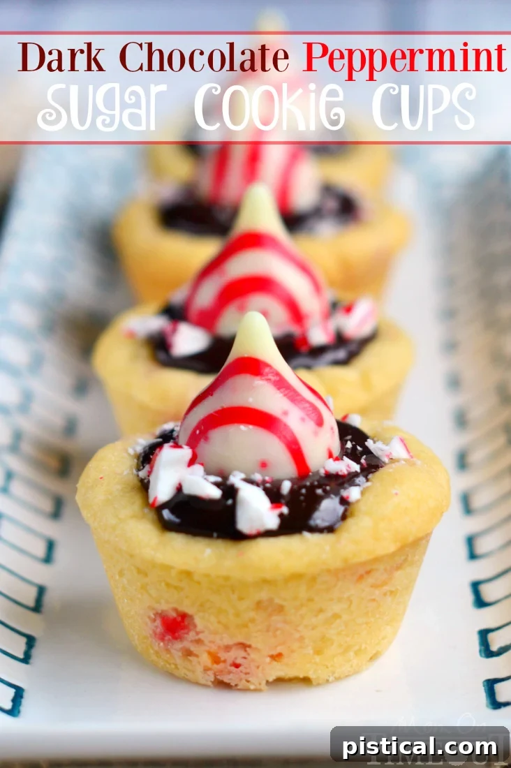 Decadent Dark Chocolate Peppermint Cookie Cups 2 Festive Dark Chocolate Peppermint Sugar Cookie Cups filled with rich chocolate ganache and crowned with Candy Cane Hershey's Kisses, perfect for holiday celebrations.