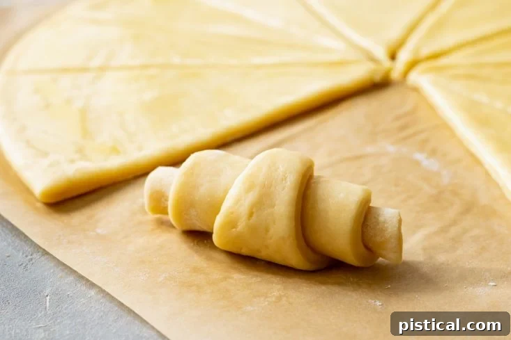 Pillowy Soft Homemade Crescent Rolls 5 Crescent roll dough perfectly shaped and rolled into their iconic crescent form