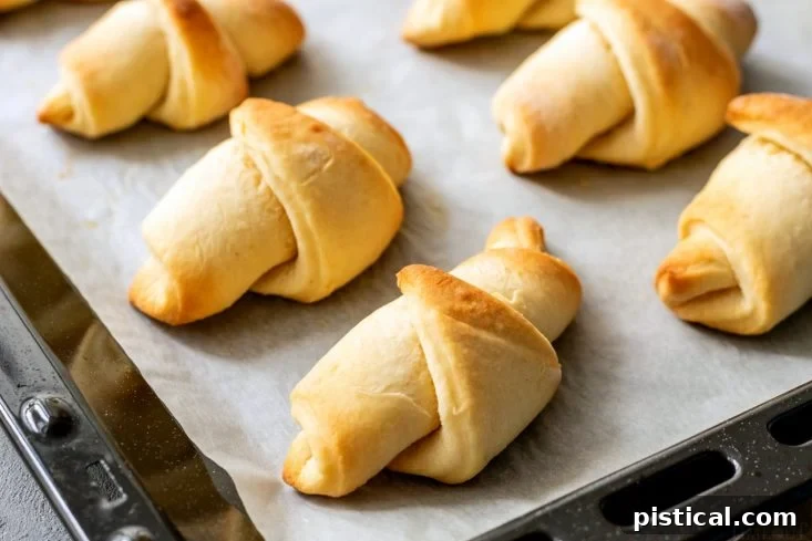Pillowy Soft Homemade Crescent Rolls 7 Another batch of golden brown crescent rolls, fresh out of the oven