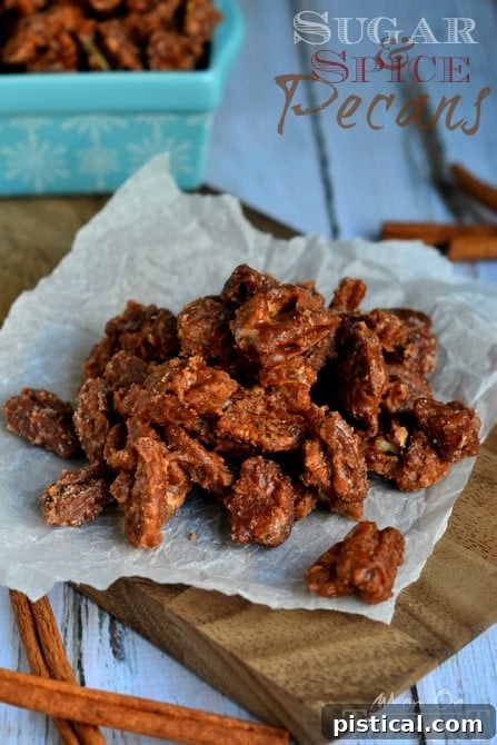 A large, rustic serving of Sugar and Spice Pecans, perfectly presented and ready to be devoured.