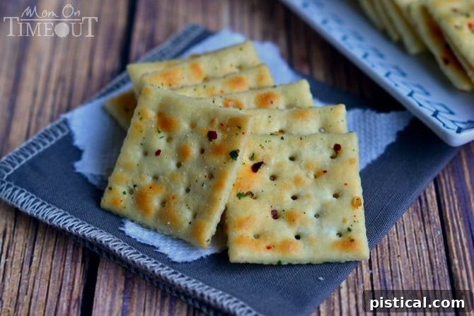 Close-up of golden brown Spicy Ranch Crackers seasoned to perfection.