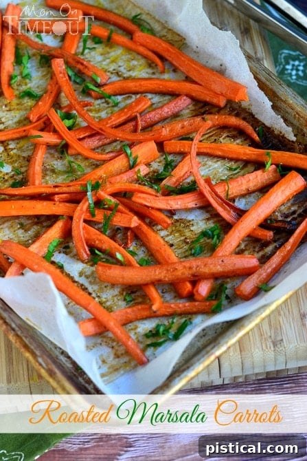 Roasted Carrots with Marsala and Herbs Freshly roasted Marsala carrots, ready to be seasoned and served.