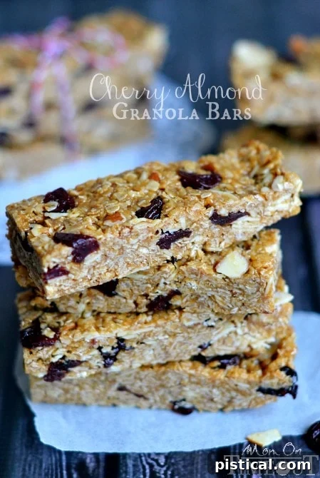 A final close-up of the delicious, wholesome Cherry Almond Granola Bars, emphasizing their perfect snack appeal.