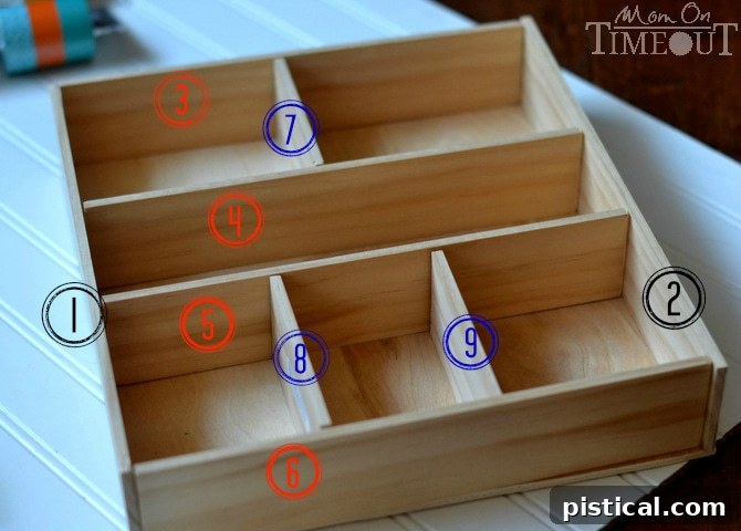 A grid of cut wooden lattice pieces laid out on a surface, ready for assembly into a drawer organizer.