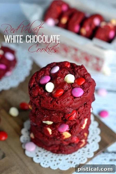 Soft, chewy Red Velvet White Chocolate Cookies made from a cake mix, arranged beautifully on a plate, ready to be served.