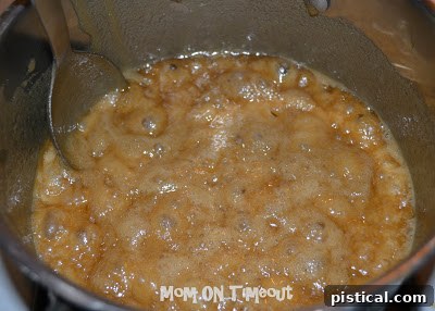 Crunchy Caramel Corn with Autumn Leaf Tags 6 Fluffy caramel sauce in a saucepan after baking soda has been added