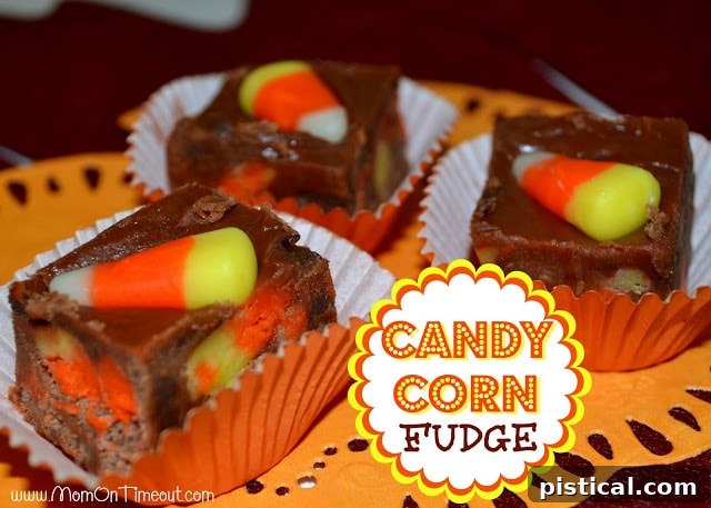 A large pan of homemade Candy Corn Fudge cooling, with neatly placed candy corn pieces arranged on the surface.