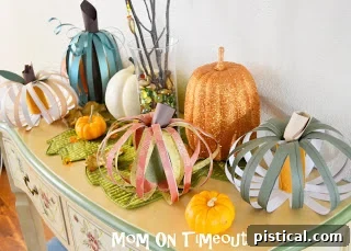Diverse Scrappy Pumpkin Creations for Autumn Decor An array of Scrappy Pumpkins in different sizes, colors, and patterns, illustrating the wide range of creative possibilities.