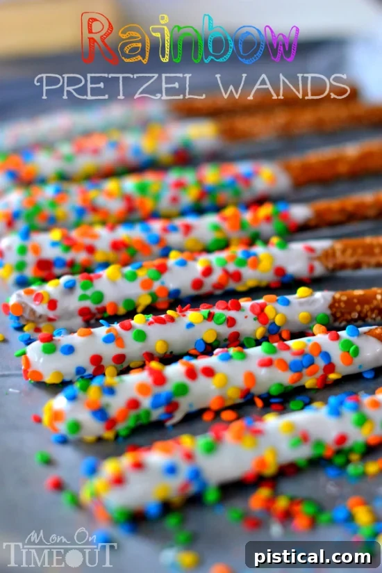 Fun and easy, these Rainbow Pretzel Wands take just minutes to make and are perfectly scrumptious! Perfect for parties, St. Patrick's Day and more! // Mom On Timeout