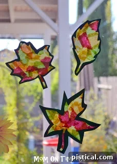 Kids having fun creating Stained Glass Fall Leaves craft
