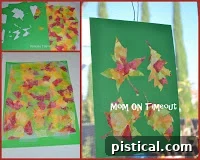 Stained glass leaf taped behind a paper cut-out template, ready for window display.