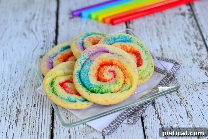 These gorgeous Rainbow Pinwheel Cookies are super easy to make and are so much fun! | MomOnTimeout.com These gorgeous Rainbow Pinwheel Cookies are super easy to make and are so much fun! | MomOnTimeout.com