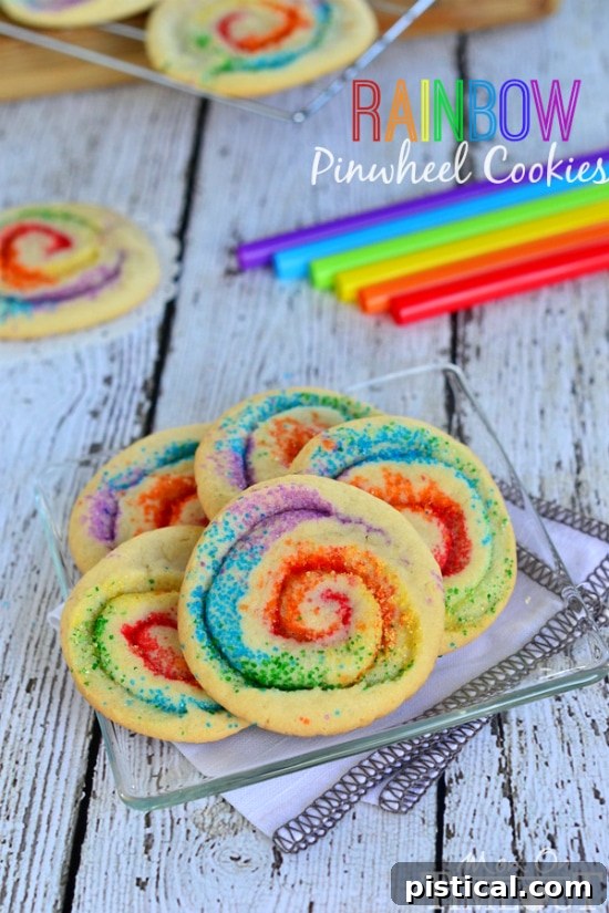 These gorgeous Rainbow Pinwheel Cookies are super easy to make and are so much fun! | MomOnTimeout.com These gorgeous Rainbow Pinwheel Cookies are super easy to make and are so much fun! | MomOnTimeout.com