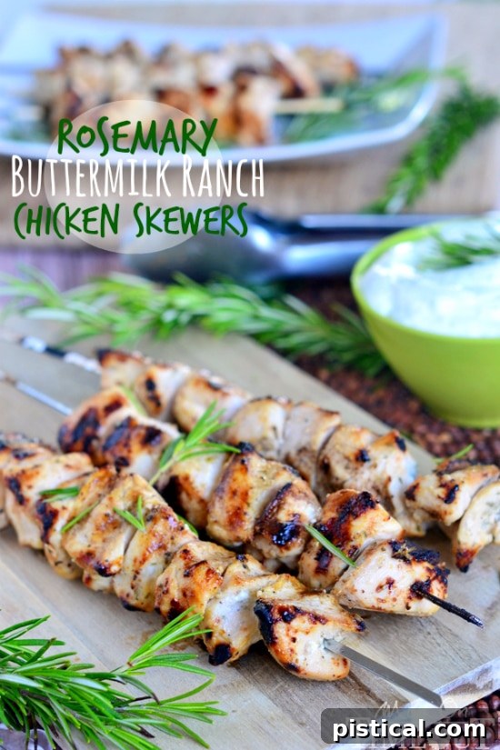 A plate of Rosemary Buttermilk Ranch Chicken Skewers with a side of ranch dip