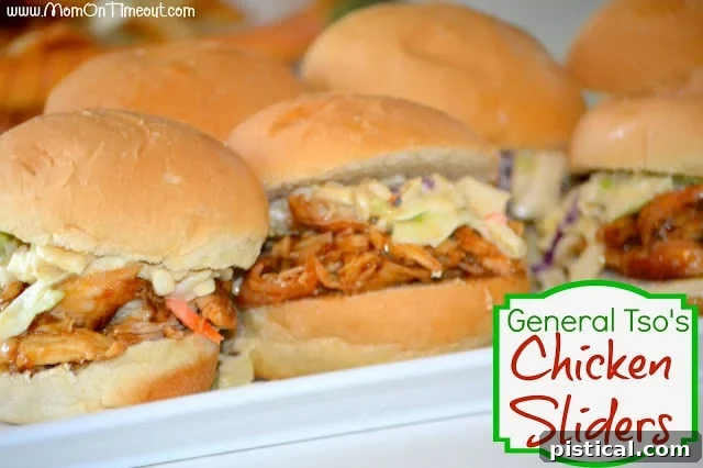 Close-up shot of General Tso's Chicken Sliders with crispy slaw, served on miniature buns.