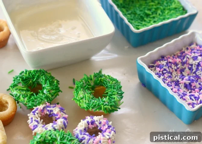 Easter Basket Cookie Cups | MomOnTimeout.com Various Easter Basket Cookie Cups showing different sprinkle colors.