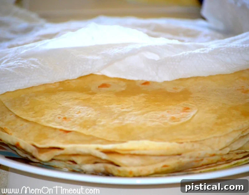 Ready When You Are Breakfast Burritos 6 warmed tortillas wrapped in paper towels and on a plate